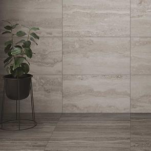 Brescia Grey Travertine Effect Tile shown on floor with plant