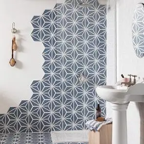 Varadero Azure blue hexagon tiles shown on shower wall and floor