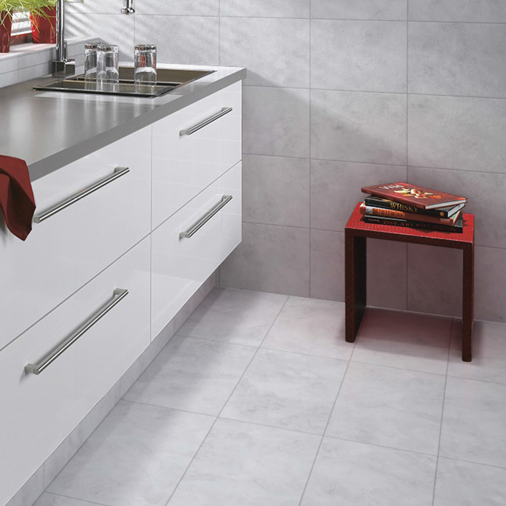 The natural beauty steel tile in a gloss white kitchen with red freestanding table