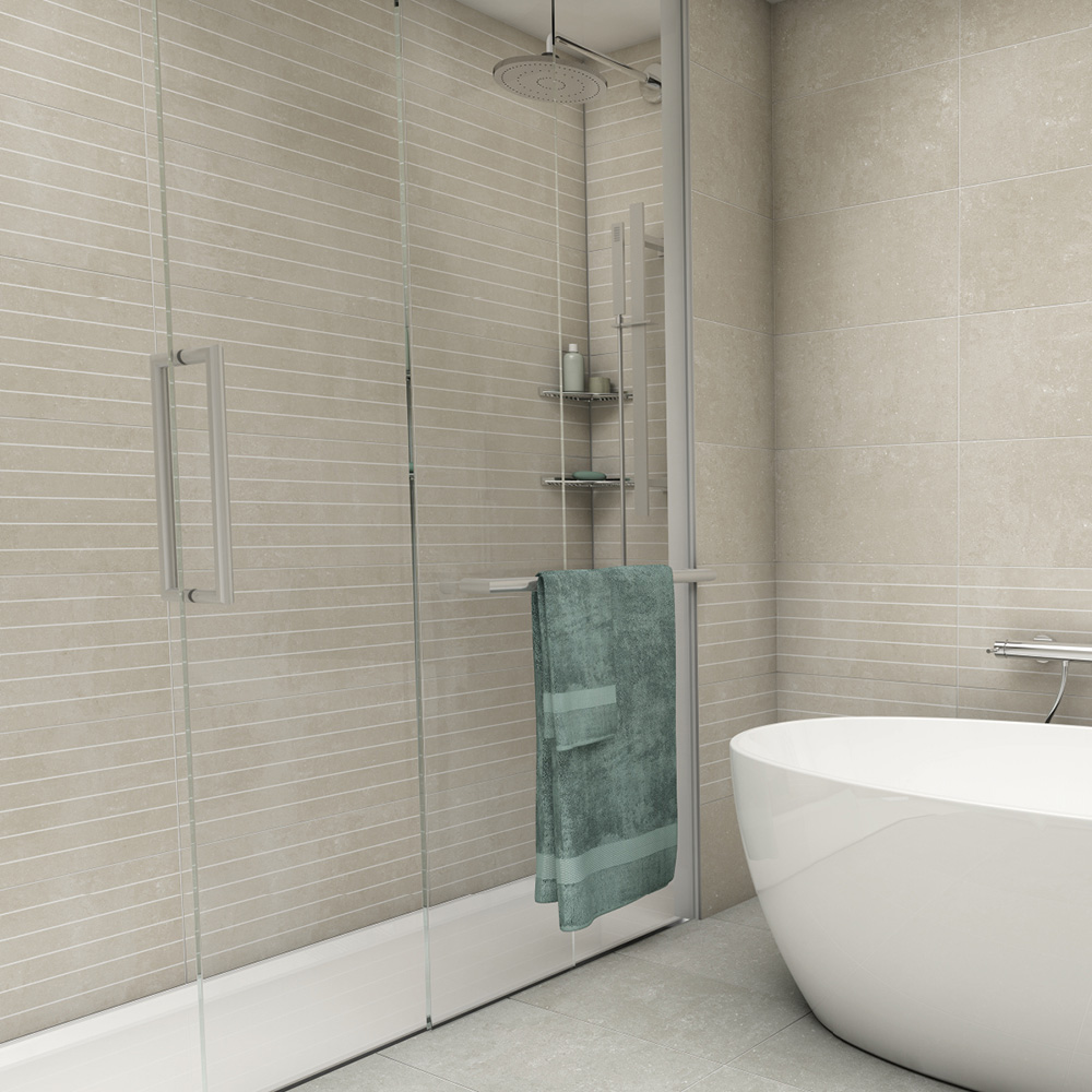York stone scored matt tile in a large shower enclosure next to a white freestanding bath