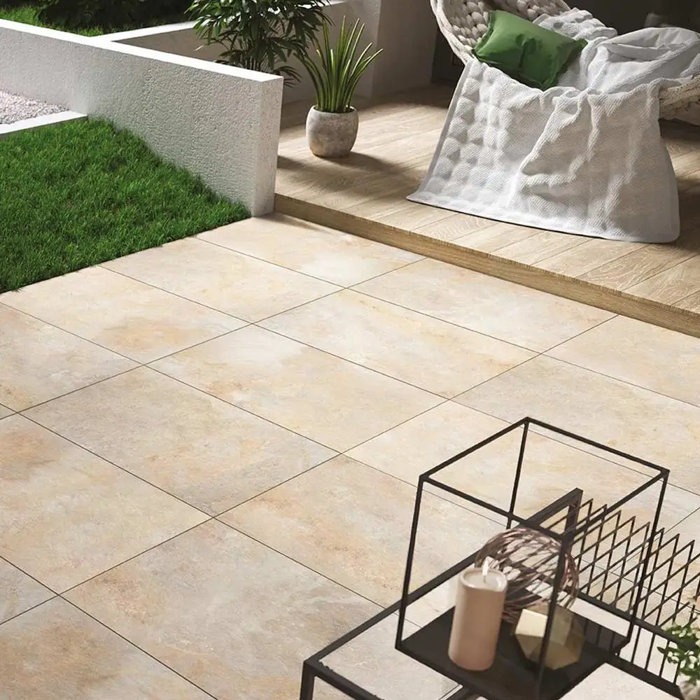 Burlington Ivory Outdoor 20mm porcelain tile on a external patio with complimenting garden furniture