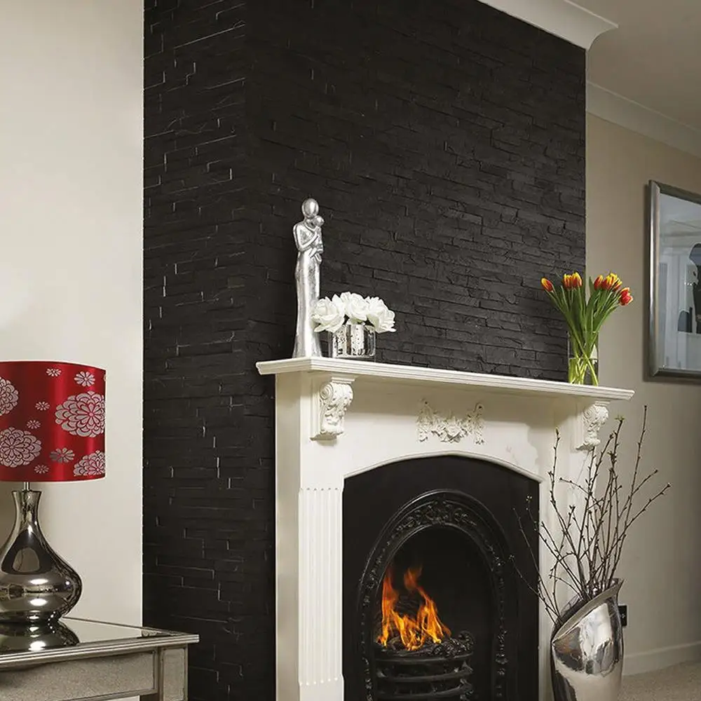 Image of Split Face tile collection showing Black tile on fireplace wal