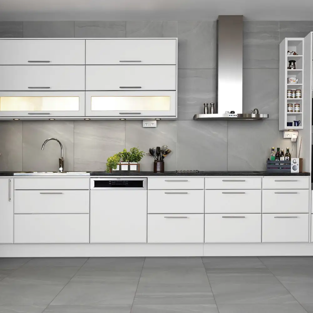 British stone grey Porcelain floor tile in a modern gloss white kitchen with matching wall tiles