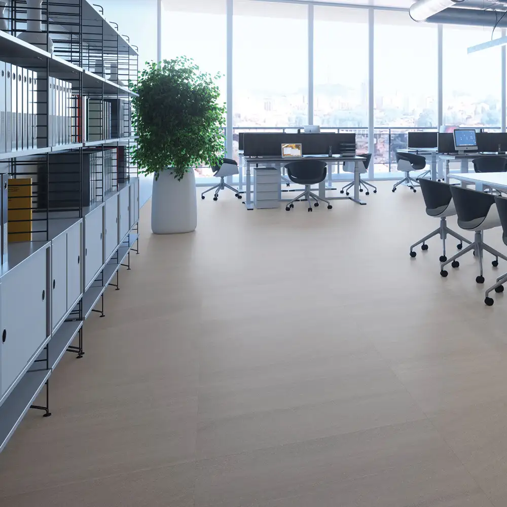 Kursaal slate soft grip tile in a large open plan living room with floor to ceiling storage and black leather sofa