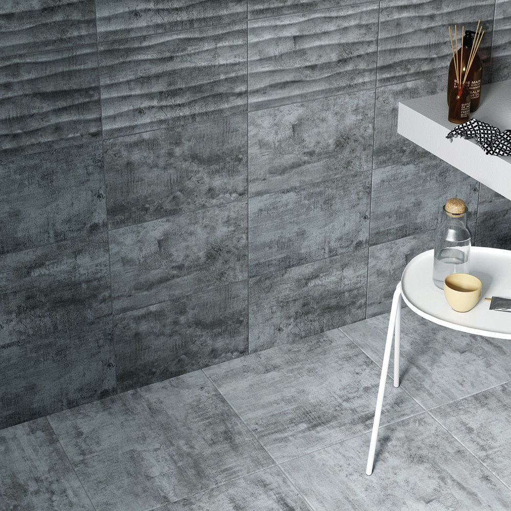 Moderrn cosy basalt wall tile being used as a covering space in a modern bathroom with complimenting feature tile