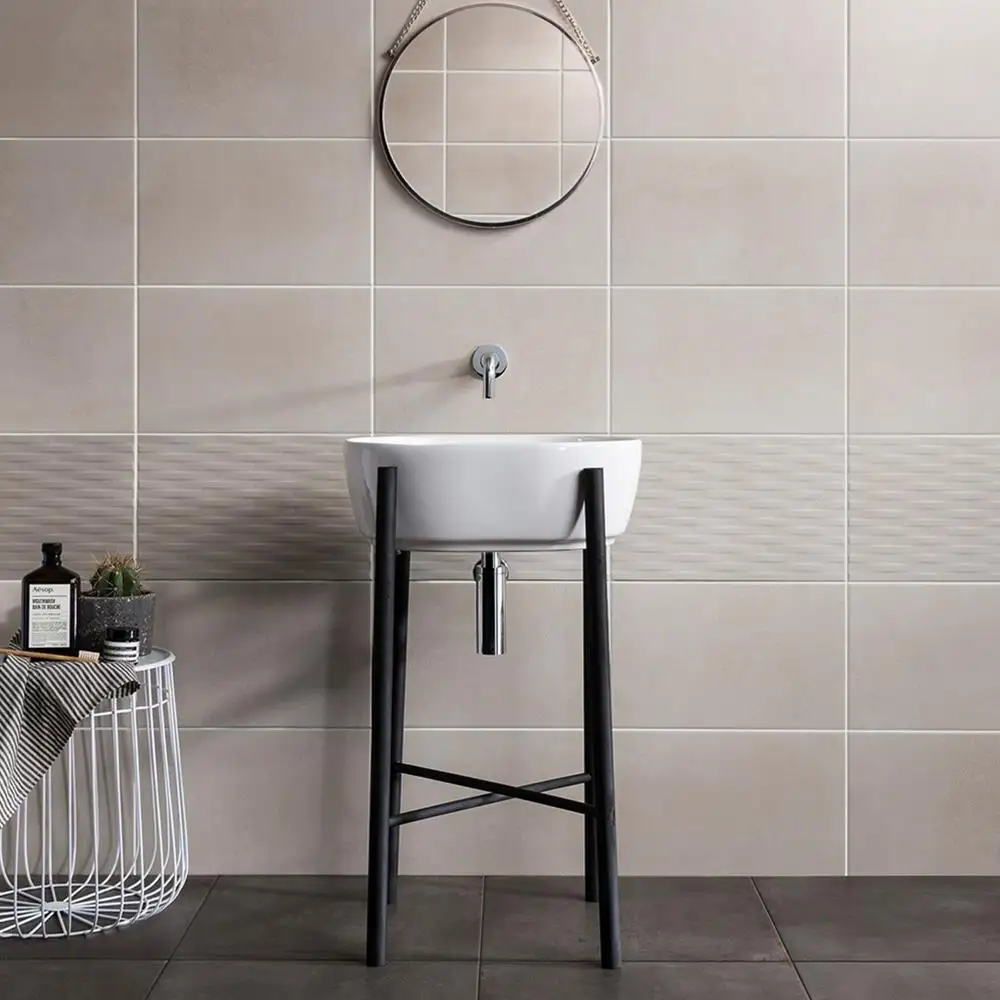 Cement tech mini décor tile used as a feature in a modern bathroom setting with matching wall tiles