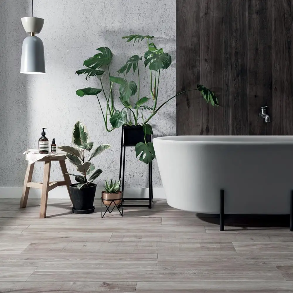 Aspenwood Greige Wood effect tile on the floor with a contrasting Aspenwood Dark wood feature in a modern bathroom setting
