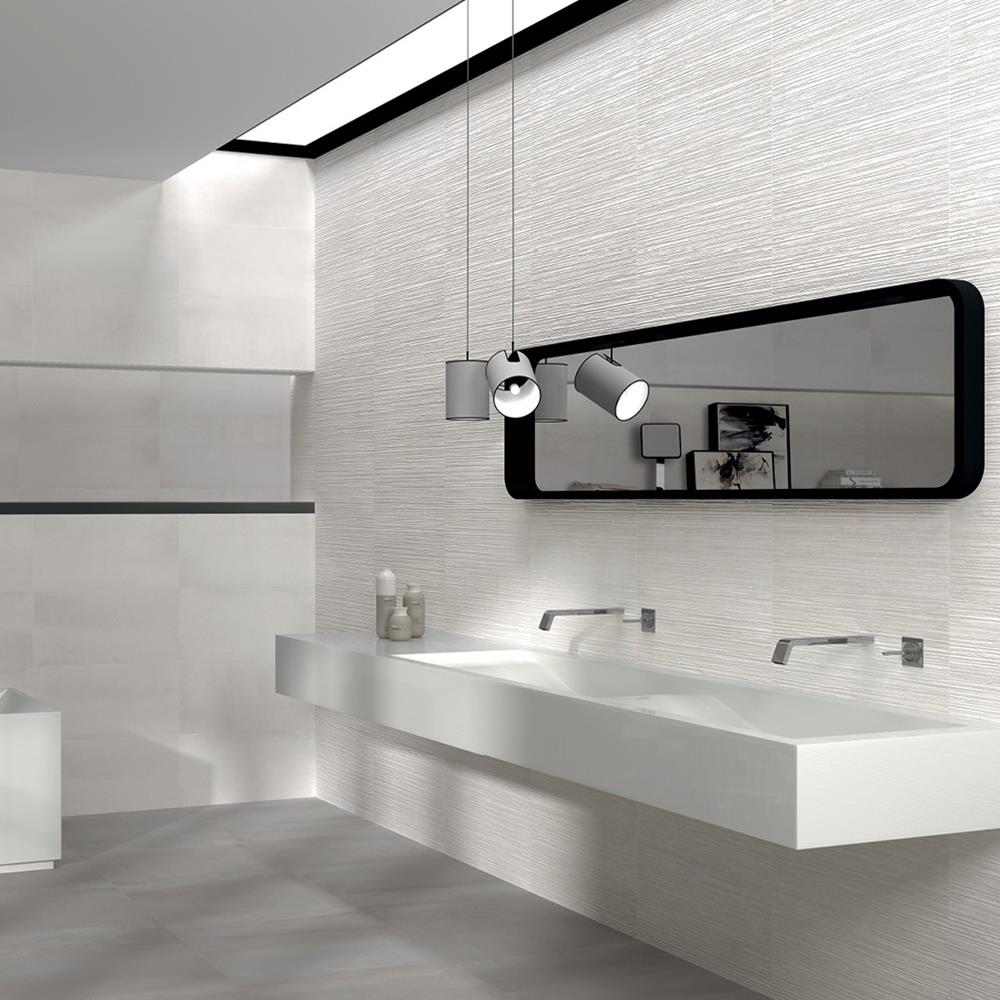 Modern bathroom design with white furnishings, contrasting black mirror and 600x300 Timeless scraped décor being used as a feature wall.