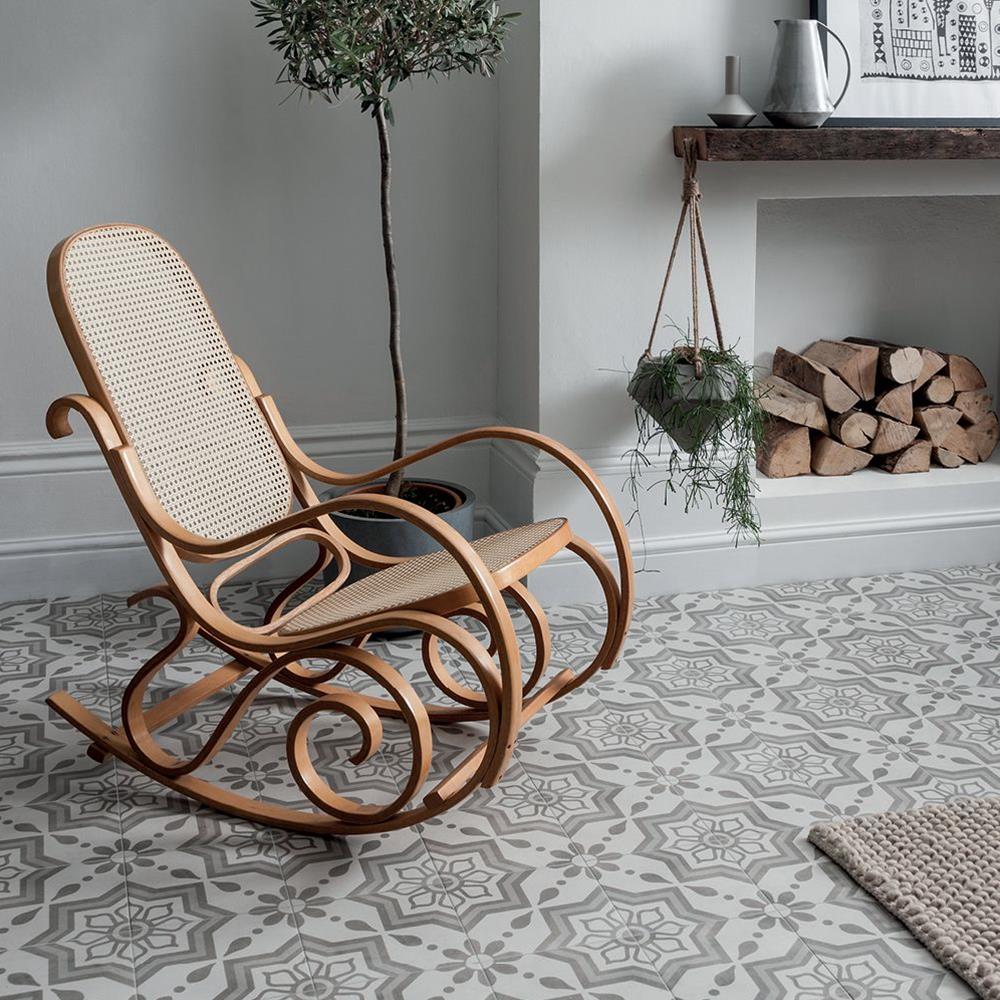 Cuban silver sky in a living room with rocking chair and open log storeage