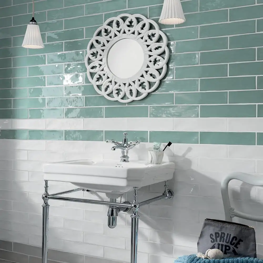 Poitiers mint green gloss tile in a traditional styled bathroom with chrome freestanding sink