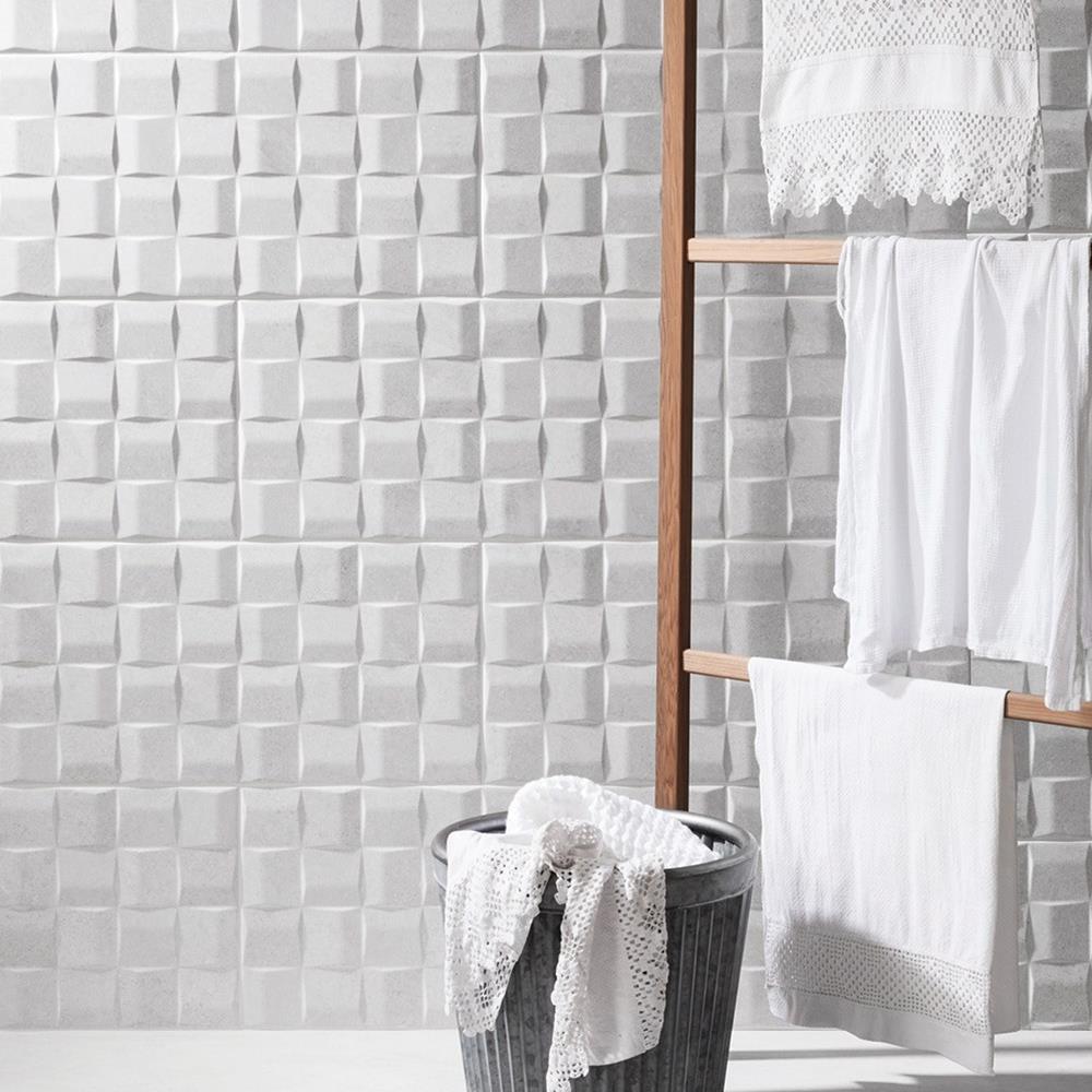 3D effect bathroom feature wall using Polesden Art décor tile in white