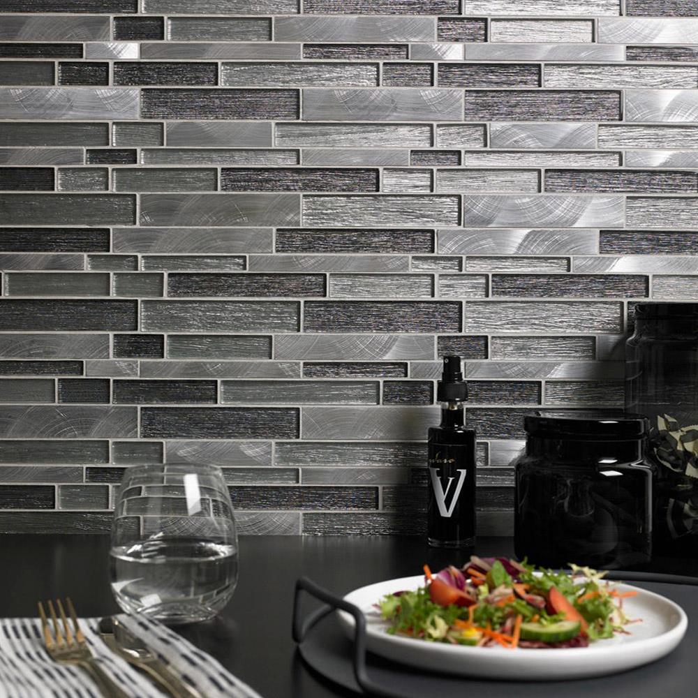 Close up of Ashby Grey Glass & Metal Mix Offset Linear Mosaic on Kitchen wall