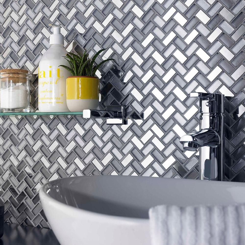 Close up of Dusk Grey Herringbone Glass & Mirror Mosaic on bathroom wall splashback