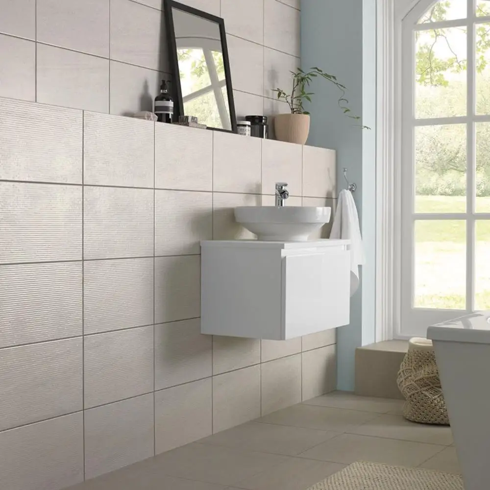 Fairford 400x250 tile in a modern cloakroom with wall hung sink and vanity, overlooking a lawn