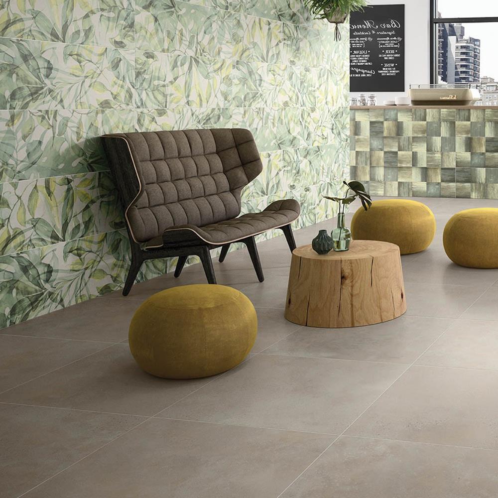 The urban light grey in a spacious reception area with floral wall pattern and contrasting yellow furniture