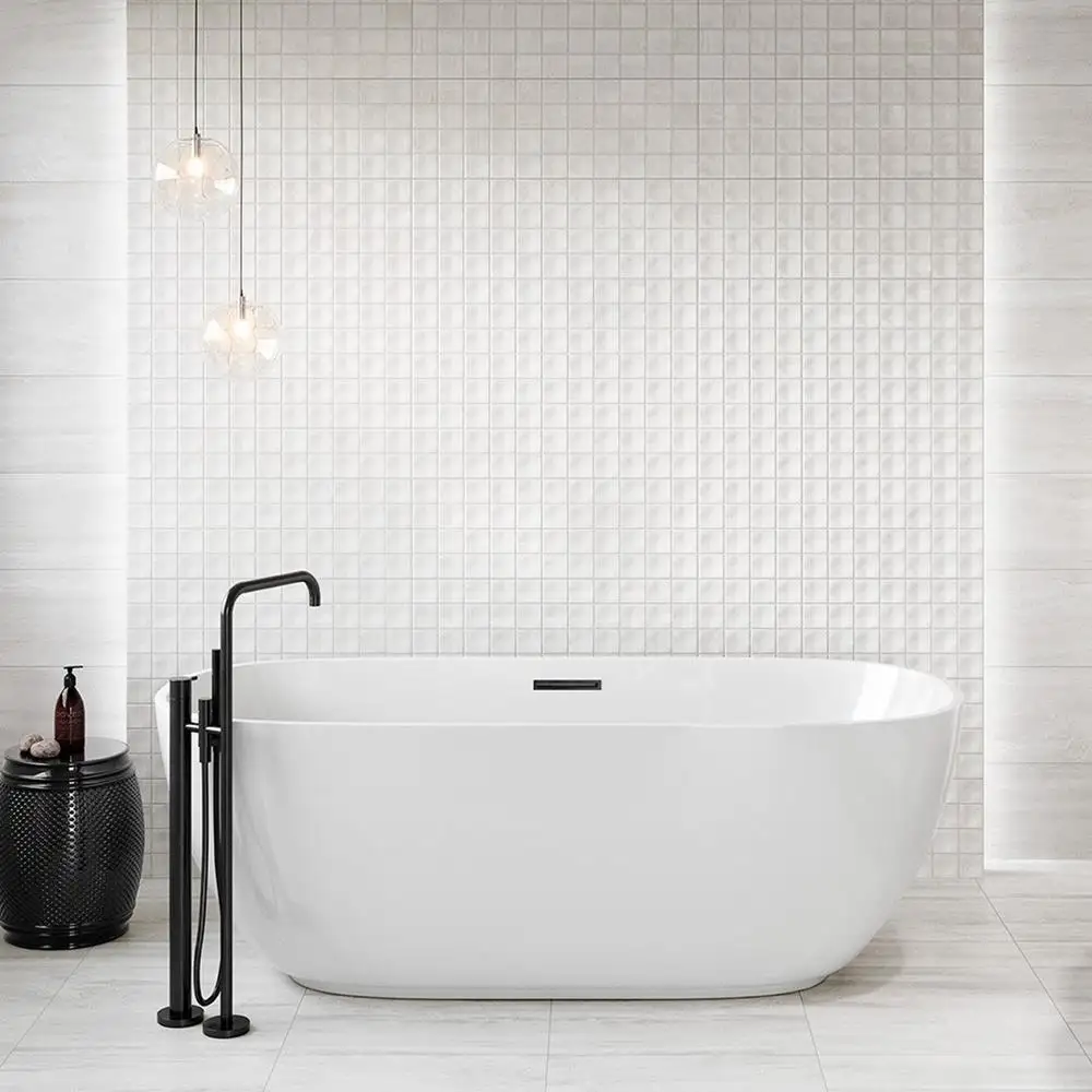 Bliss White stone effect Concept Décor tile on contemporary bathroom feature wall with freestanding bath and mixer unit