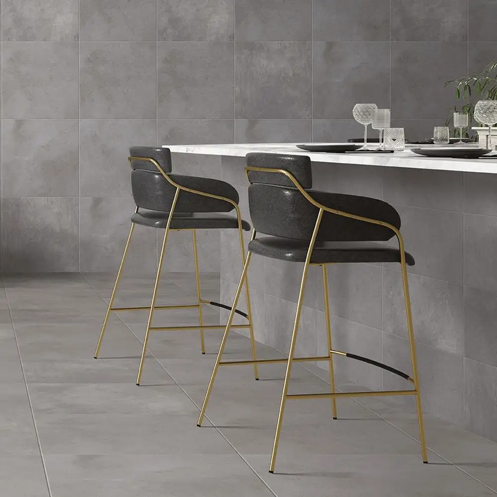 Grey Cementine wall tiles in contemporary kitchen with marble breakfast bar