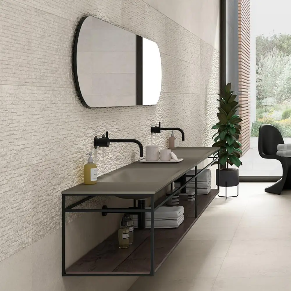 Knole textured cream décor tiles on modern bathroom wall with coordinating plain wall and floor tiles