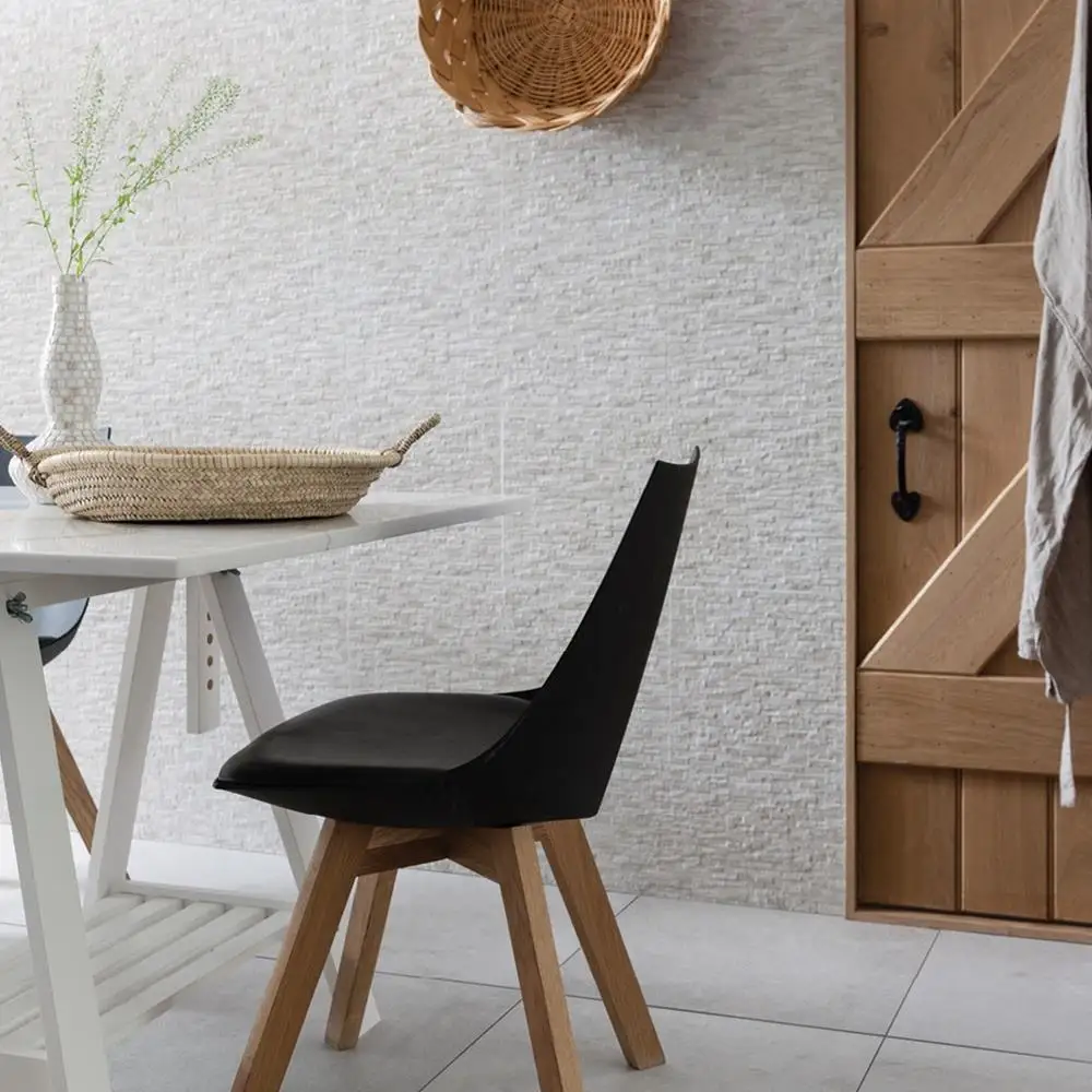 Knole white tile on dining room floor with textured feature wall